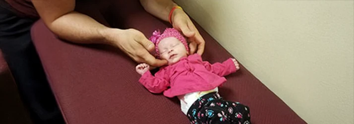 Chiropractor Osceola IA Kyle Ellensohn Pediatric Chiropractic Care On Infant